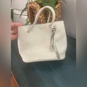 Calvin Klein small bucket bag off white. With blue interior and small coin bag.